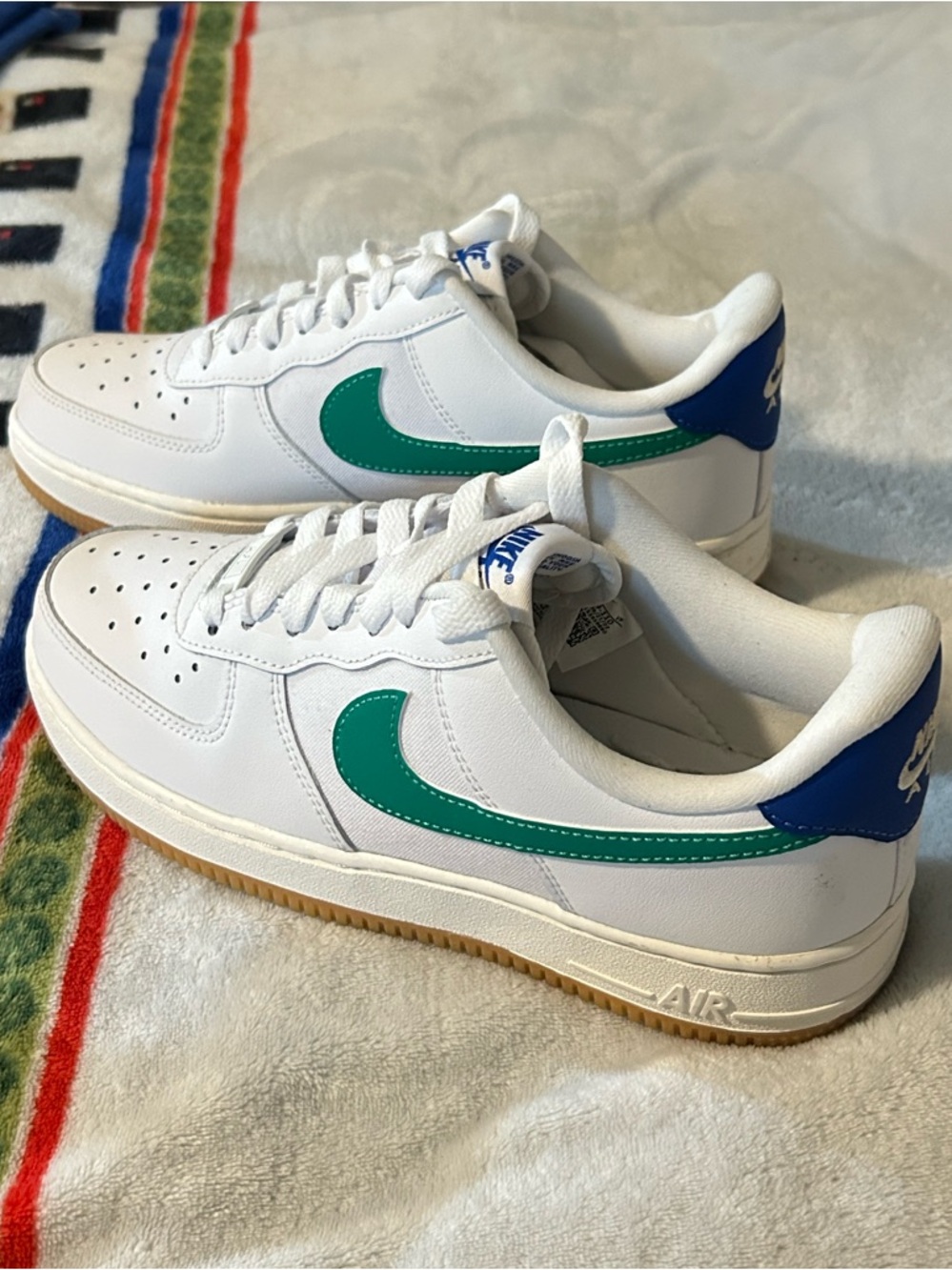 Nike Air Force 1s teal swoosh with blue heel